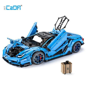a blue car with a car on top of it 